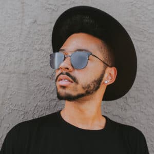 a man wearing glasses and looking at the camera a man wearing glasses and looking at the camera