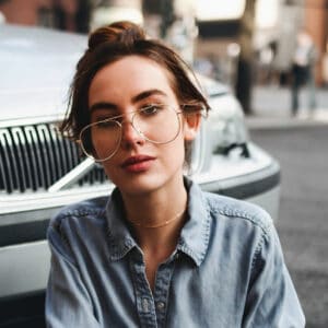 a person wearing glasses a person wearing glasses