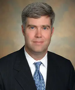 a man wearing a suit and tie